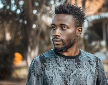 Man photographed outdoors in Kampala