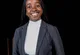 Professional woman in a dark suit