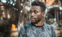 Man photographed outdoors in Kampala