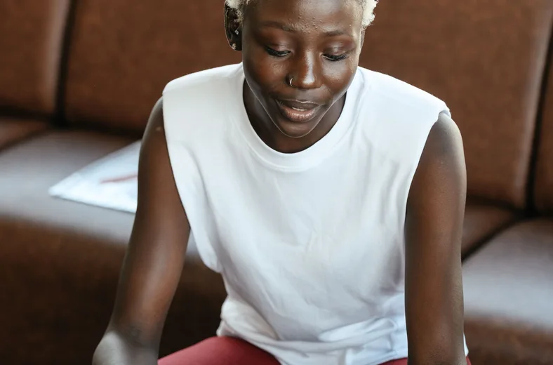 Black businesswoman reviewing documents at a desk