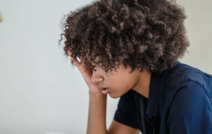 Black businesswoman working on a laptop