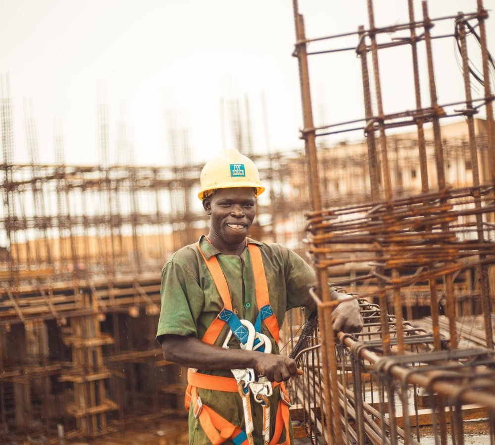 Construction worker wearing safety equipment in Kitgum