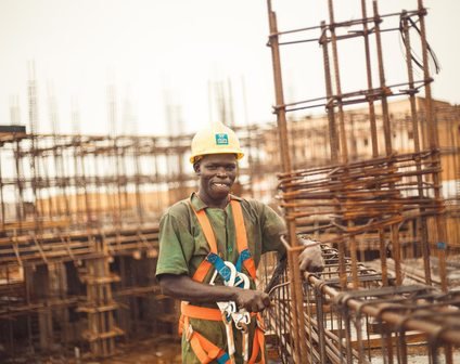 Construction worker wearing safety equipment in Kitgum