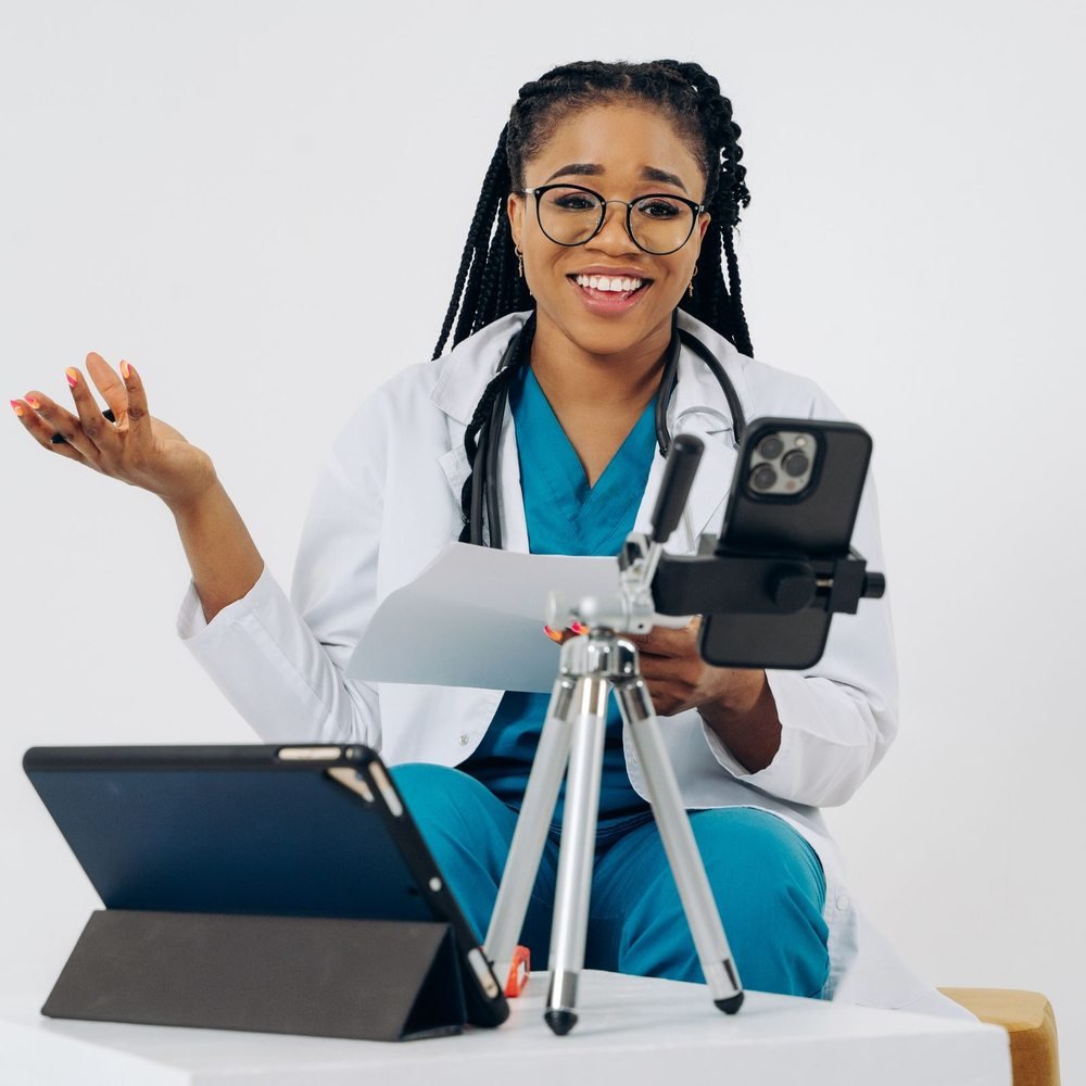 Black female doctor providing an online consultation