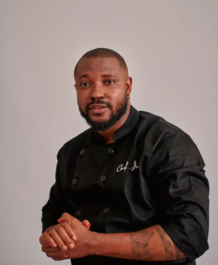 Portrait of a Black chef in professional uniform