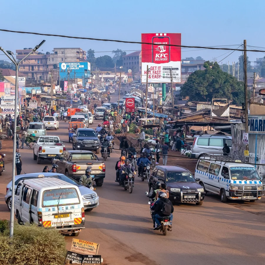 A busy Kampala street with local transport