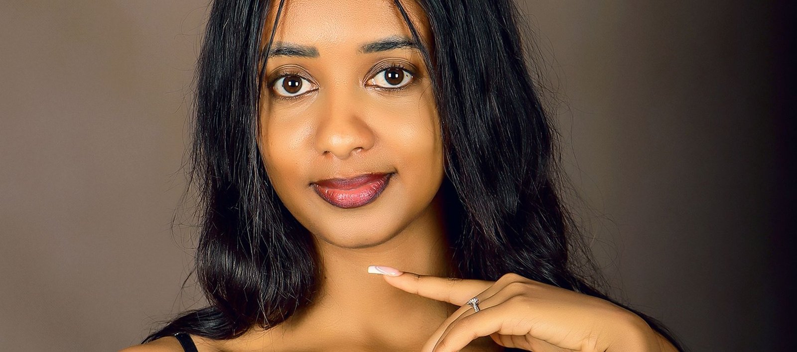 Woman photographed in a Kampala portrait studio