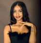 Woman photographed in a Kampala portrait studio