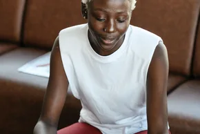 Black businesswoman reviewing documents at a desk
