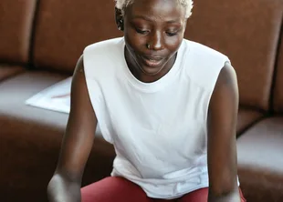 Black businesswoman reviewing documents at a desk