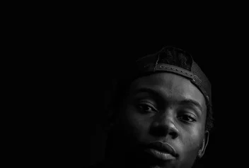 Black and white studio portrait in Kampala