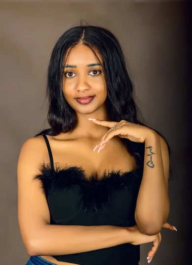 Woman photographed in a Kampala portrait studio