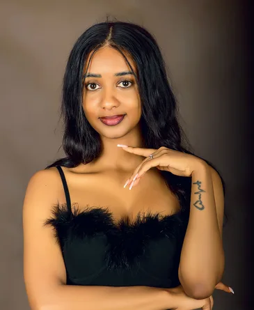Woman photographed in a Kampala portrait studio