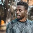 Man photographed outdoors in Kampala