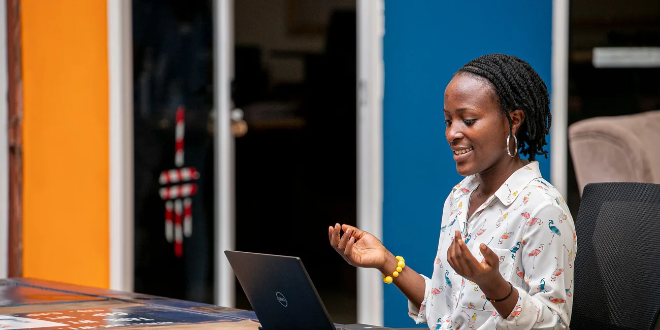 Woman using a laptop in Kampala