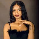 Woman photographed in a Kampala portrait studio
