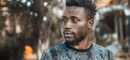 Man photographed outdoors in Kampala