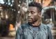 Man photographed outdoors in Kampala