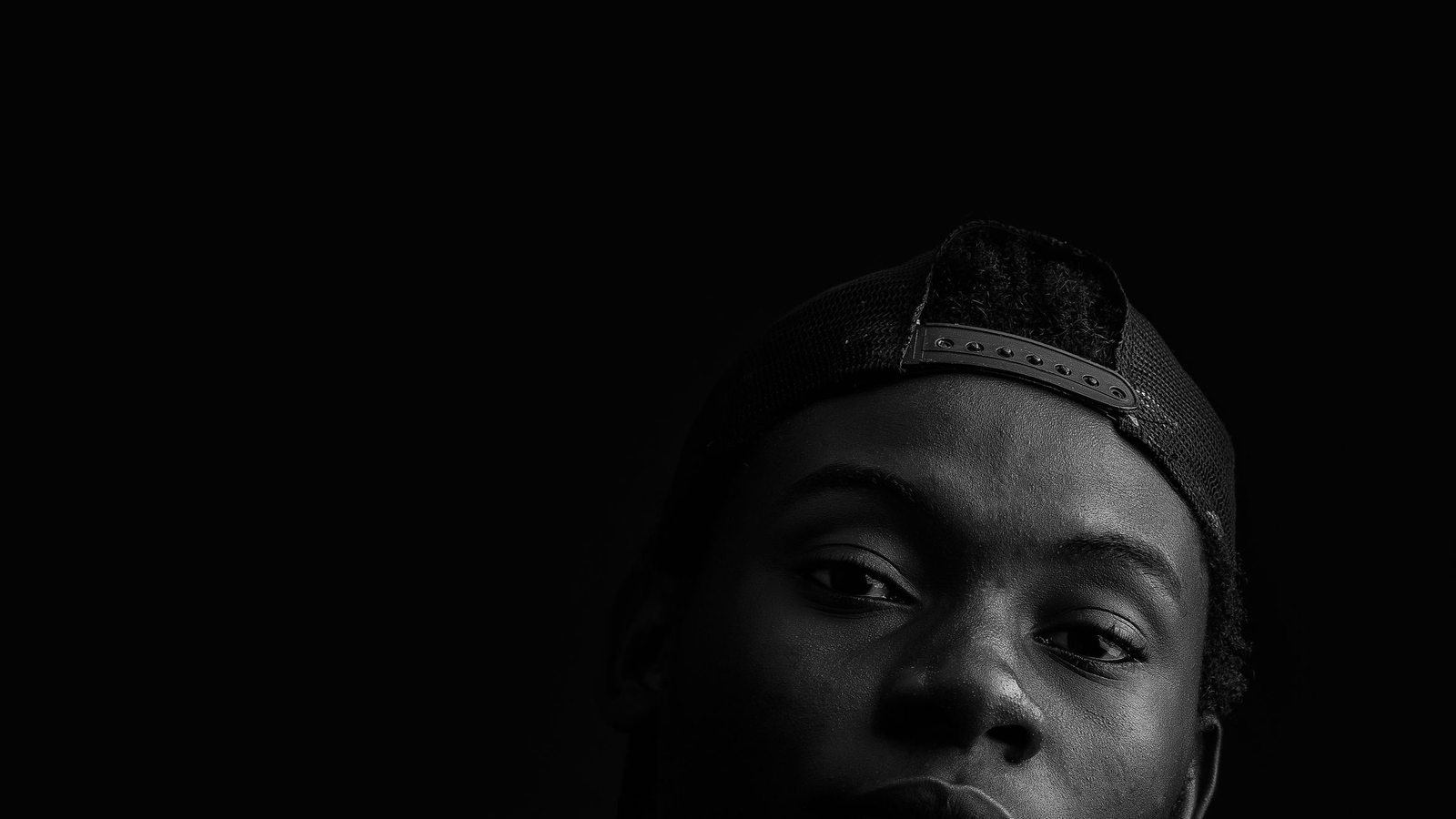 Black and white studio portrait in Kampala