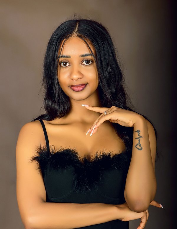 Woman photographed in a Kampala portrait studio
