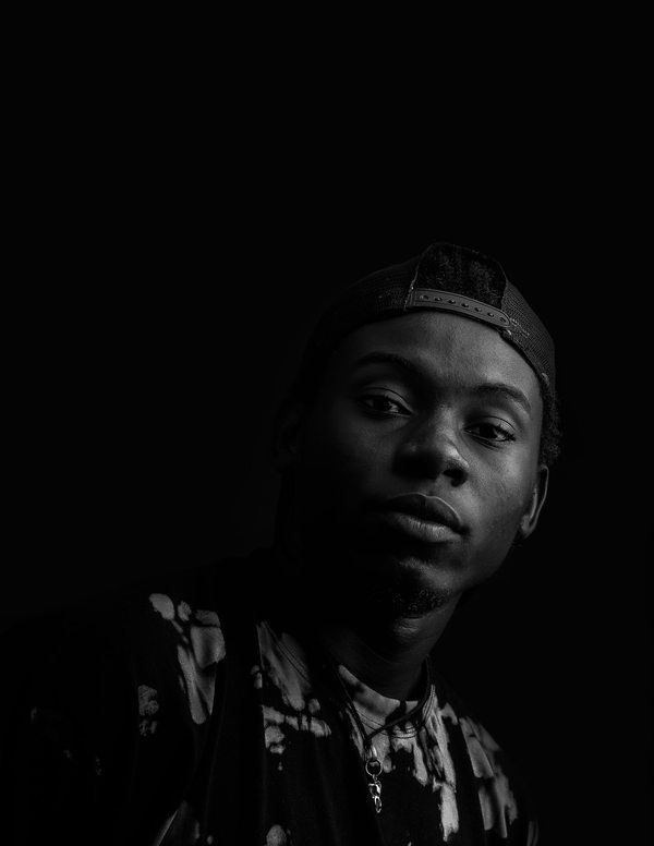 Black and white studio portrait in Kampala