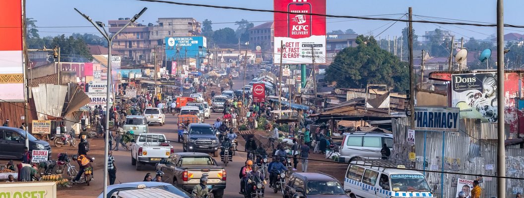 A busy Kampala street with local transport