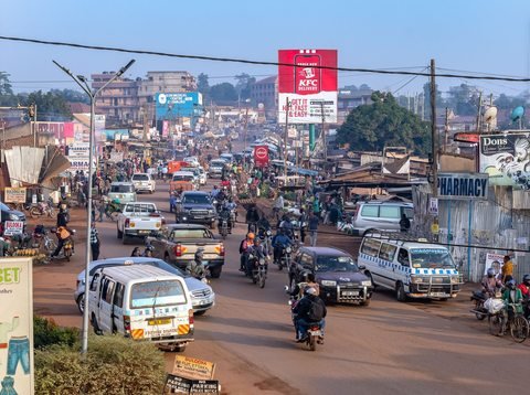 A busy Kampala street with local transport