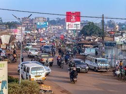A busy Kampala street with local transport