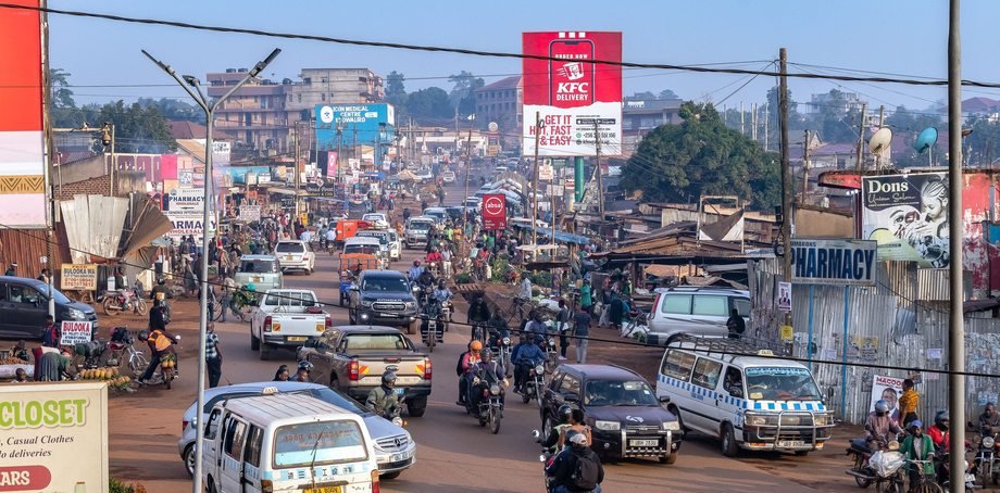 A busy Kampala street with local transport