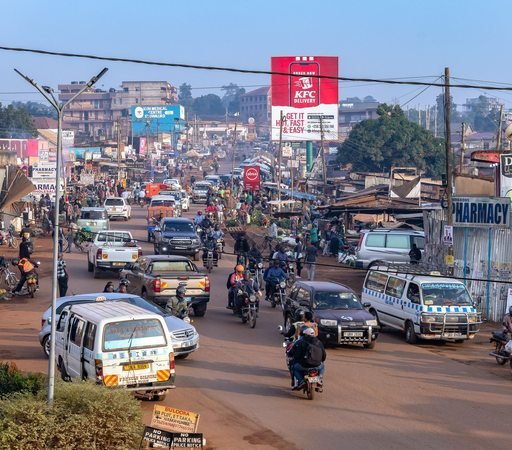 A busy Kampala street with local transport