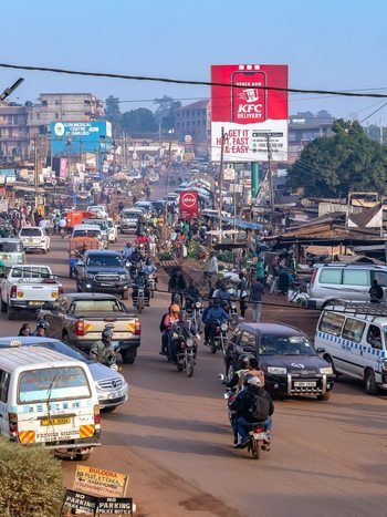 A busy Kampala street with local transport