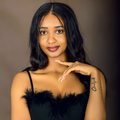 Woman photographed in a Kampala portrait studio