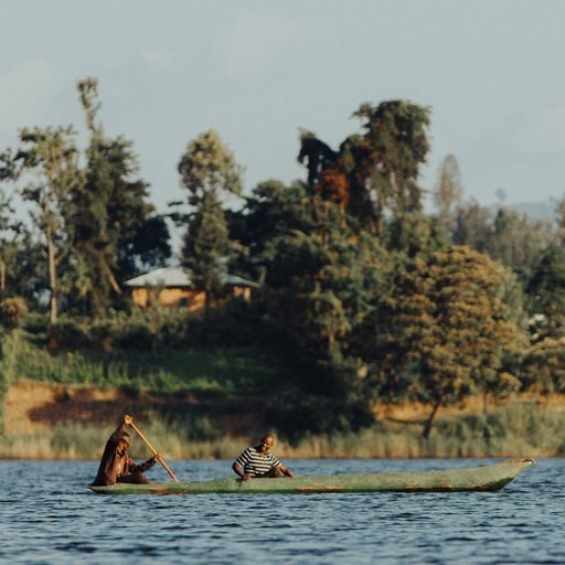 Canoe on a lake in the Ugandan landscape
