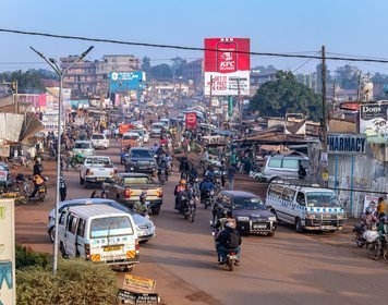 A busy Kampala street with local transport