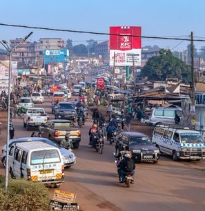 A busy Kampala street with local transport