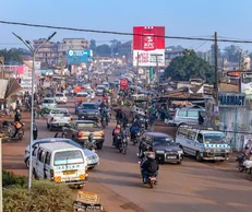 A busy Kampala street with local transport