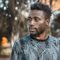 Man photographed outdoors in Kampala