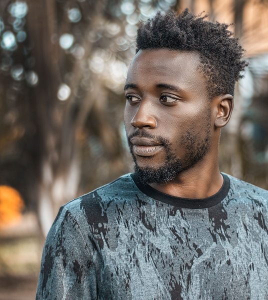 Man photographed outdoors in Kampala