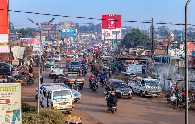 A busy Kampala street with local transport