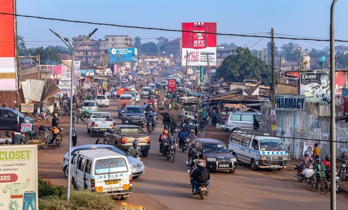 A busy Kampala street with local transport