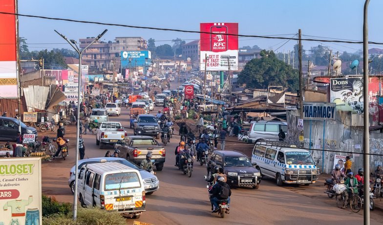 A busy Kampala street with local transport