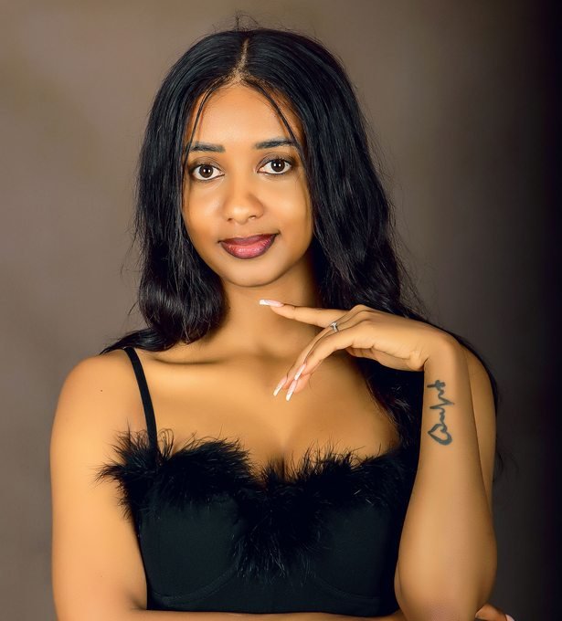 Woman photographed in a Kampala portrait studio