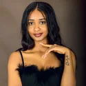 Woman photographed in a Kampala portrait studio
