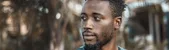 Man photographed outdoors in Kampala