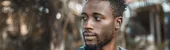 Man photographed outdoors in Kampala