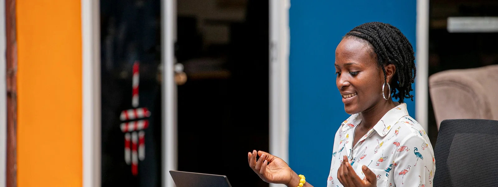 Woman using a laptop in Kampala