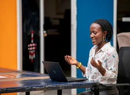 Woman using a laptop in Kampala