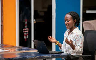 Woman using a laptop in Kampala