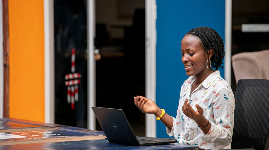 Woman using a laptop in Kampala